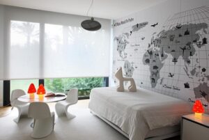 Habitacion infantil con mural mapa mundi